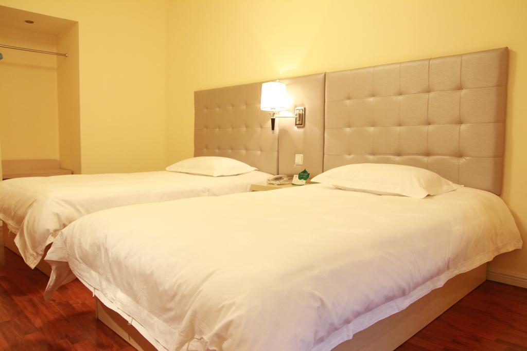 Qingdao Renjia Bussiness Hotel Room photo